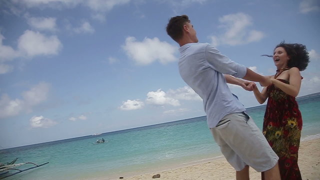 Happy couple on tropical beach