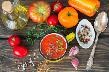 Homemade thick soup made of tomatoes and roasted bell peppers
