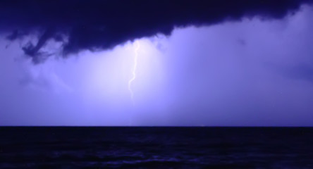 lightning by night at the beach
