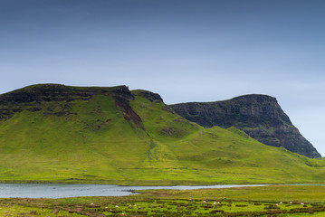 Fototapeta na wymiar Mountains and ocean in Neist Point, isle of Skye, Scotland