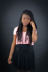 Beautiful girl doing different expressions in different sets of clothes: you are crazy