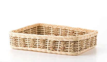 wicker basket on white background