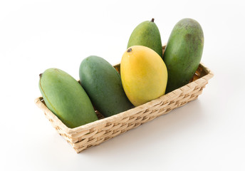 green and yellow mango on white background