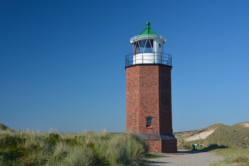 Fototapeta na wymiar Leuchtturm auf der Insel Sylt