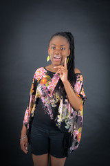 Fototapeta premium Beautiful girl doing different expressions in different sets of clothes: idea