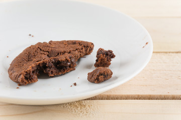soft dark chocolate brownie cookies on wood