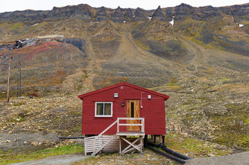 Lone small red building, Longyearbyen, Svalbard, Norway.