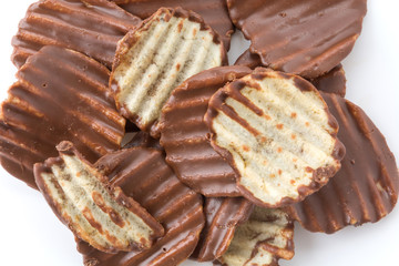 potato chip with chocolate on white