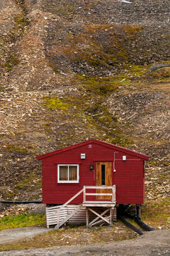 Lone small red building, Longyearbyen, Svalbard, Norway.