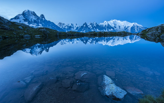 France, Mont Blanc, Lake Cheserys, Mont Blanc reflected in the lake at blue hour