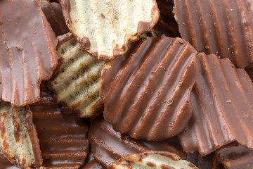 potato chip with chocolate on white