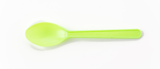 plastic spoon on white background