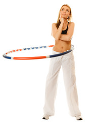 sporty fit girl doing exercise with hula hoop.