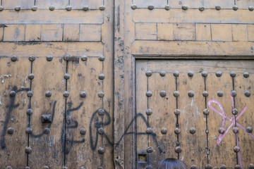 old wooden door Castilian style in Toledo Spain