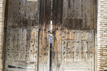 old wooden door Castilian style in Toledo Spain