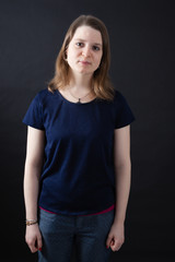 Obraz premium Beautiful woman doing different expressions in different sets of clothes: love