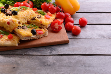 Delicious homemade pizza on table close-up