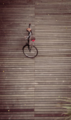bicycle on the wooden floor in  filter
