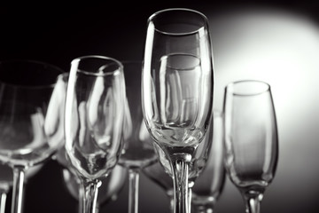 Empty champagne glasses on gray background
