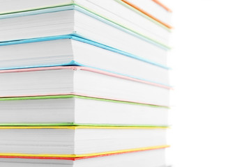 Colorful books isolated on white
