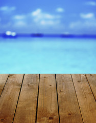 Wooden table  with abstract  blur background