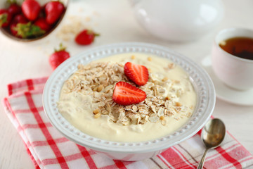 Healthy breakfast with homemade oatmeal, close up