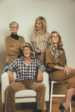 Portrait of family dressed like in the Eighties