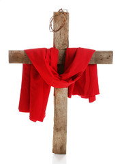 Cross with crown of thorns and red cloth, isolated on white