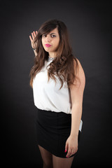 Beautiful woman doing different expressions in different sets of clothes: be careful