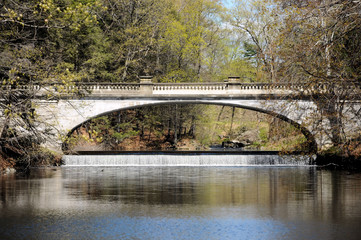 Bridge over the Falls / Bridge and lake in up state New York