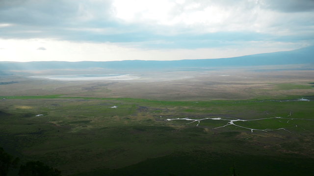 Africa. Tanzania. Serengeti. Ngorongoro crater National Park Panoramic view static camera Nature Background Landscape. Safari Travel tourism adventure in wild animal nature