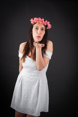 Beautiful woman doing different expressions in different sets of clothes: kiss