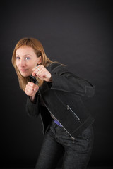 Fototapeta premium beautiful woman doing different expressions in different sets of clothes: boxe