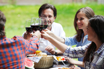 two young couples eating dinner