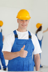 workman gives thumbs up