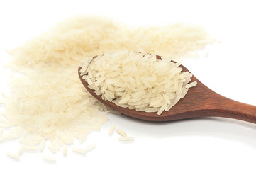 White rice in wooden spoon isolated