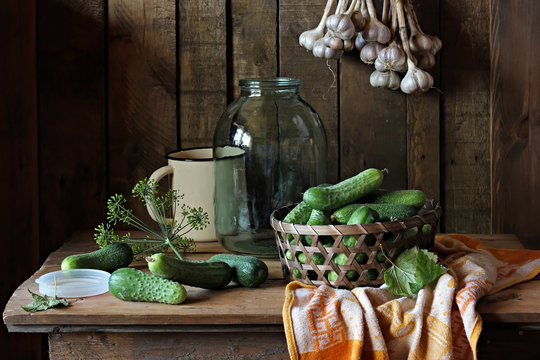 Still life with cucumbers, fennel and garlic.