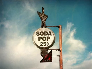 Fotobehang Retro compositie aged and worn vintage photo of retro soda pop sign