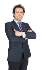 Handsome arabic man doing different expressions in different sets of clothes: arms crossed