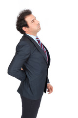 Handsome arabic man doing different expressions in different sets of clothes: backache