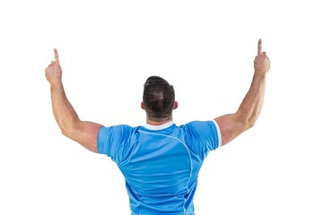 Rugby player cheering and pointing