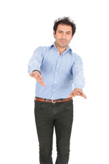 Handsome arabic man doing different expressions in different sets of clothes: posing