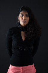 Beautiful woman doing different expressions in different sets of clothes: thinking