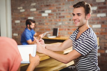 Waitress taking order with a tablet