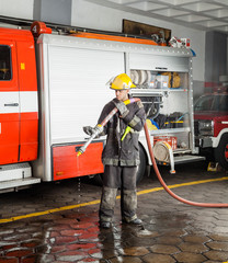 Fireman Holding Water Hose During Training