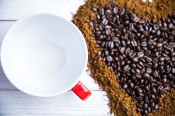 Coffee on a table in heart shape