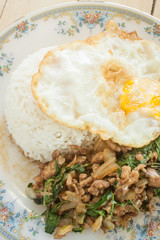 fried basil chicken fried egg thai food