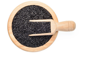 black sesame in the wooden plate, (large depth of field, taken with tilt shift lens)