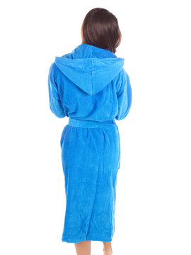 Beautiful girl in wellness bathrobe, white background