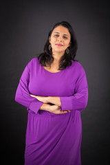 Obraz premium Beautiful woman doing different expressions in different sets of clothes: arms crossed